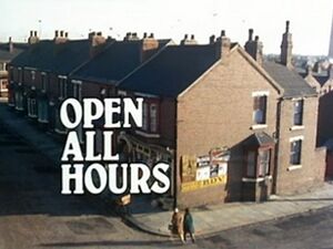 1976 title card. The series title appears over an aerial shot of the corner shop.